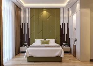 Uma cama ou camas num quarto em ZARA HoTEL