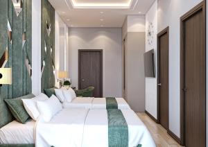 Uma cama ou camas num quarto em ZARA HoTEL