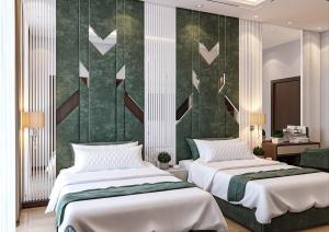 Uma cama ou camas num quarto em ZARA HoTEL