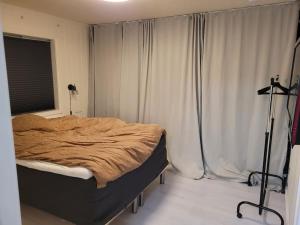 Postel nebo postele na pokoji v ubytování Hareid