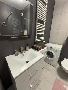 Ένα μπάνιο στο Apartament Relax 55 +17 φωτογραφίες
