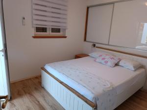 Posteľ alebo postele v izbe v ubytovaní House Isabella