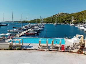a marina with a bunch of boats in the water at Aniva in Drage