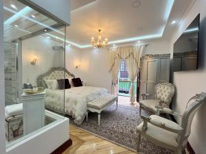 Letto o letti in una camera di Hotel & Rooftop King Experience by David