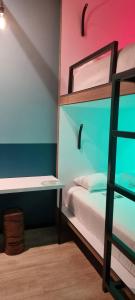 Llit o llits en una habitació de Polynesian Cabins by Kon Tiki