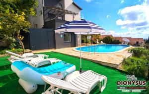 The swimming pool at or close to Arode Villa Dionysus