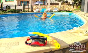 The swimming pool at or close to Arode Villa Dionysus
