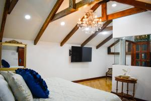 TV o dispositivi per l'intrattenimento presso Hotel & Rooftop King Experience by David