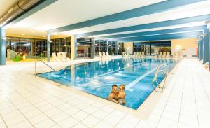 Bazén v ubytovaní Joglland Hotel Prettenhofer alebo v jeho blízkosti