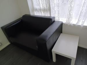 Posezení v ubytování Byron View House R6