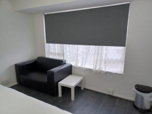 Posezení v ubytování Byron View House R6