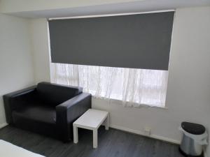 Posezení v ubytování Byron View House R6
