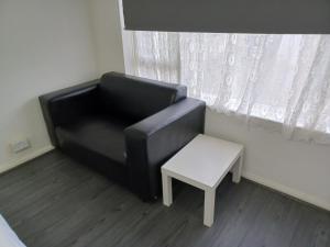Posezení v ubytování Byron View House R6
