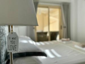Postel nebo postele na pokoji v ubytování Olive Apartment