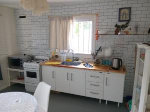 Η κουζίνα ή μικρή κουζίνα στο Casa Om