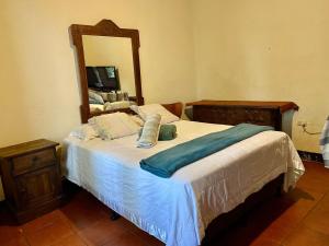 Ένα ή περισσότερα κρεβάτια σε δωμάτιο στο La casita de Charlie