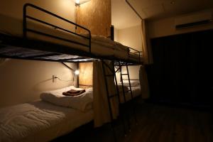 Letto o letti in una camera di Hiroei Hostel