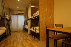 Letto o letti in una camera di Hiroei Hostel