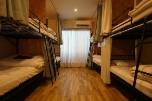 Letto o letti in una camera di Hiroei Hostel