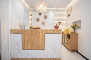 Fotografie z fotogalerie ubytování 迦尔纳酒店 v Jinghongu