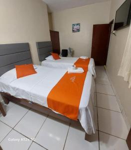Postel nebo postele na pokoji v ubytování Hostal Resident Piura - Suite plaza