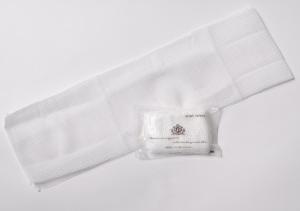 a white scarf with a roll of white thread at APA Hotel Kobe Sannomiya in Kobe