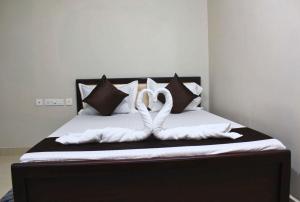 Letto o letti in una camera di Hotel Yubraj