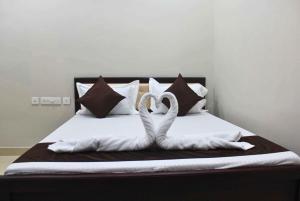 Letto o letti in una camera di Hotel Yubraj