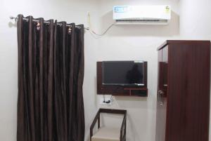 TV o dispositivi per l'intrattenimento presso Hotel Yubraj