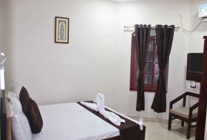 Letto o letti in una camera di Hotel Yubraj