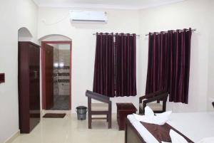 Letto o letti in una camera di Hotel Yubraj