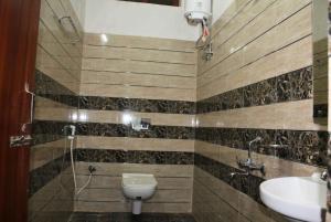 Koupelna v ubytování Hotel Yubraj