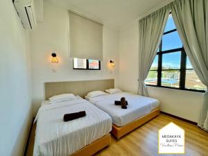 Postel nebo postele na pokoji v ubytování 6 BEDROOMS PENTHOUSE MARINA COURT CITY CENTRE - 19pax + 19 fotografií