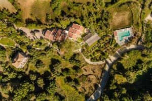 an aerial view of a house and a road at Costa Avithos in Svoronata