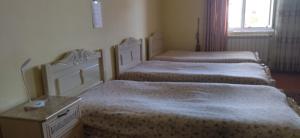 Voodi või voodid majutusasutuse The Lichk Lodge toas