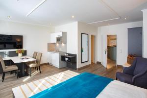 Kuchyň nebo kuchyňský kout v ubytování Boardinghouse Pfarrkirchen