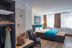 Postel nebo postele na pokoji v ubytování Boardinghouse Pfarrkirchen