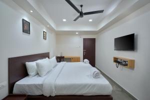 Postel nebo postele na pokoji v ubytování Reach Inn