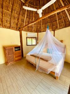 Postel nebo postele na pokoji v ubytování Cabanas Jaalkab + 37 fotografií