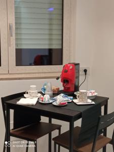 Příslušenství pro přípravu čaje a kávy v ubytování Blumoon boutique