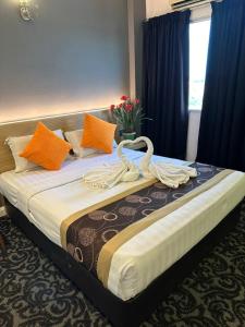 Ένα ή περισσότερα κρεβάτια σε δωμάτιο στο Greenlast Hotel +7 φωτογραφίες