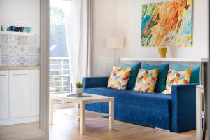 Posedenie v ubytovaní APARTAMENTY "LA VILLA" SUPERIOR II z dwoma sypialniami, balkonem, parkingiem, blisko centrum