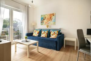 Posedenie v ubytovaní APARTAMENTY "LA VILLA" SUPERIOR II z dwoma sypialniami, balkonem, parkingiem, blisko centrum