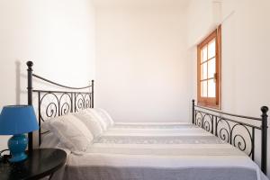 En eller flere senge i et værelse på Ines