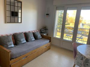 Χώρος καθιστικού στο Appartement lumineux à 100m des Thermes avec balcon et Wi-Fi - FR-1-541-143