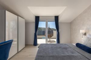 Postel nebo postele na pokoji v ubytování Family Resort Santa Maria II Penthouse - Happy Rentals