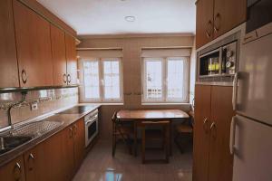 Η κουζίνα ή μικρή κουζίνα στο Candás Playa Apartamento