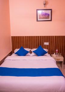 Łóżko lub łóżka w pokoju w obiekcie Hotel White Yak