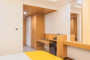 Kuchyň nebo kuchyňský kout v ubytování Hotel Turmeric