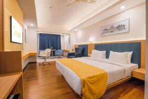 Postel nebo postele na pokoji v ubytování Hotel Turmeric